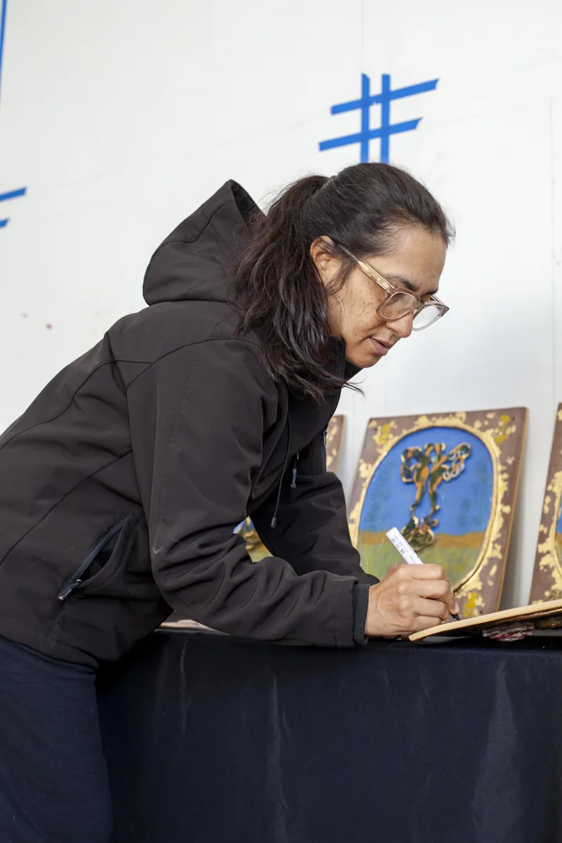 Hand-building ceramic tile at Wave Pool