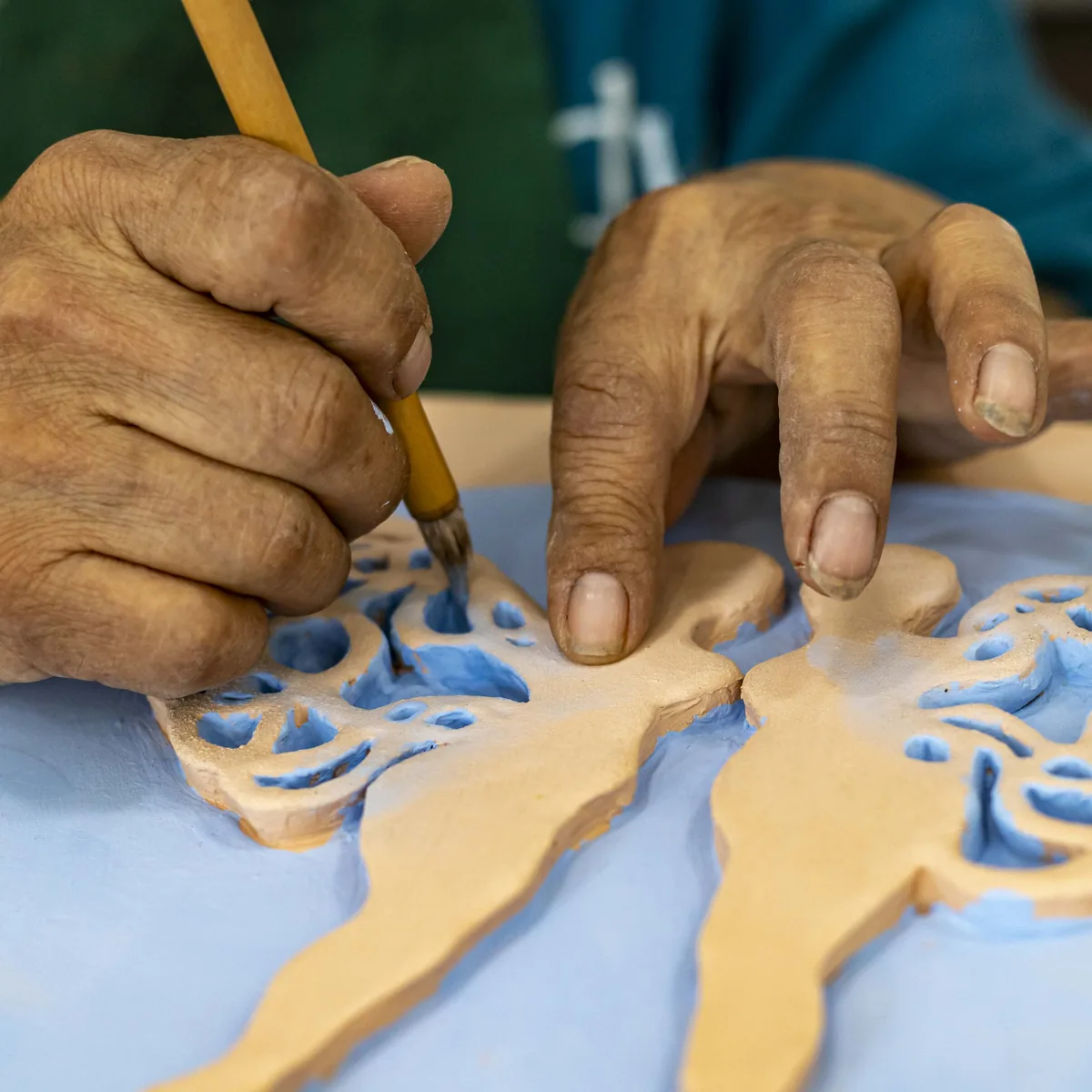 Detailing ceramic bas-relief tile